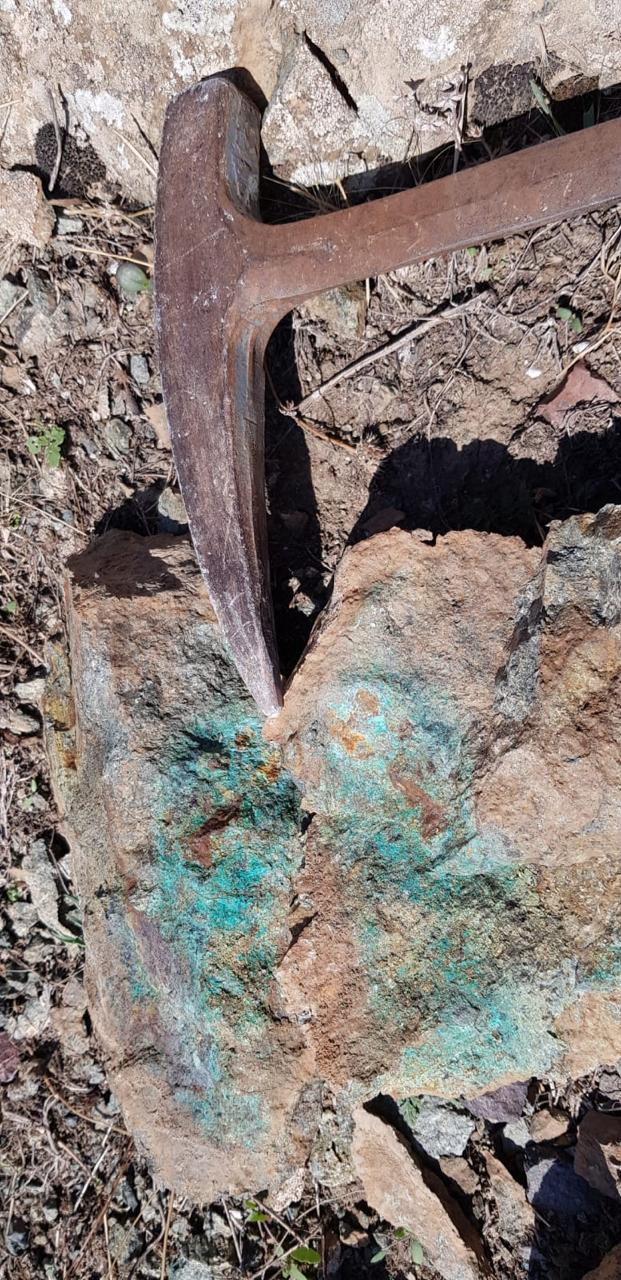 Hammer on rock sample