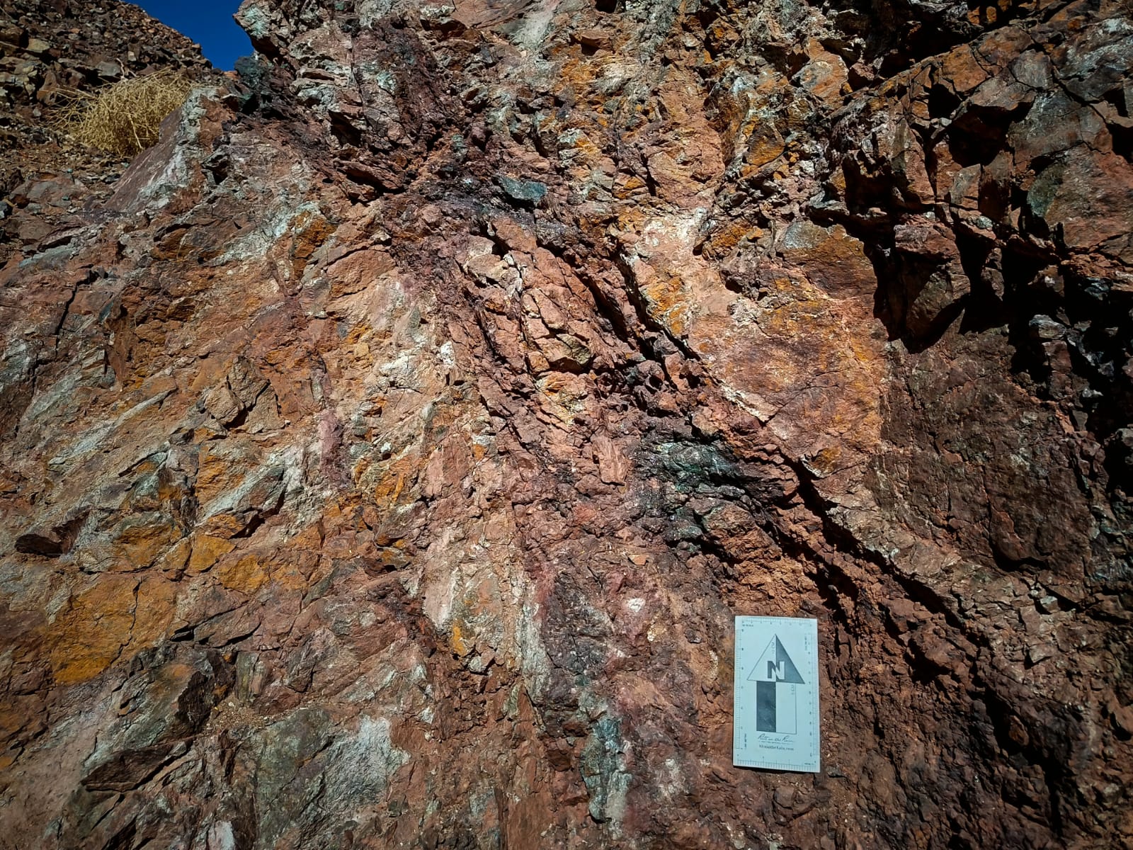 Rock wall with scale card